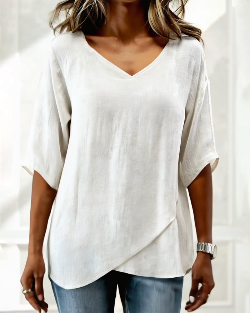 Alejandra - Blusa con bajo asimétrico y escote en V