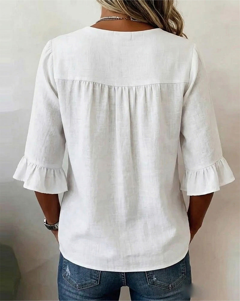 Erika - Blusa lisa con botones