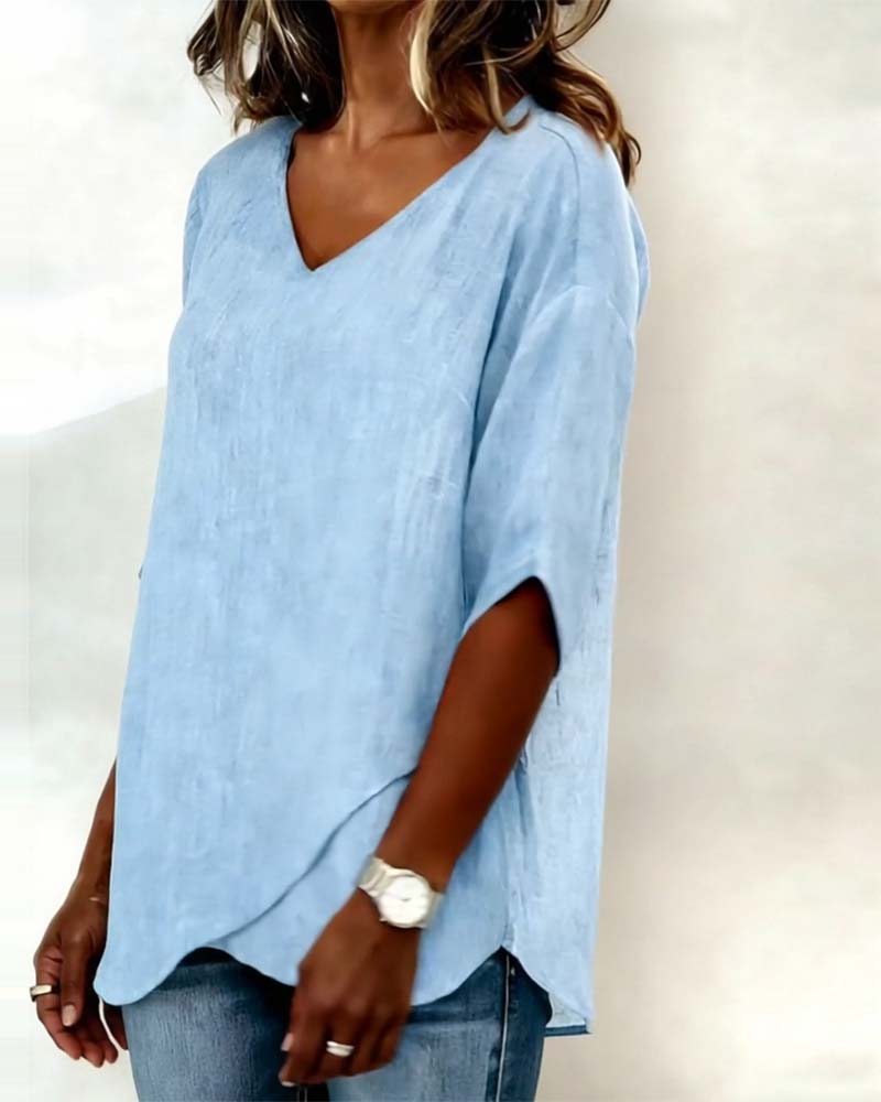 Alejandra - Blusa con bajo asimétrico y escote en V