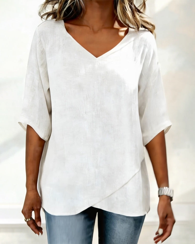 Alejandra - Blusa con bajo asimétrico y escote en V