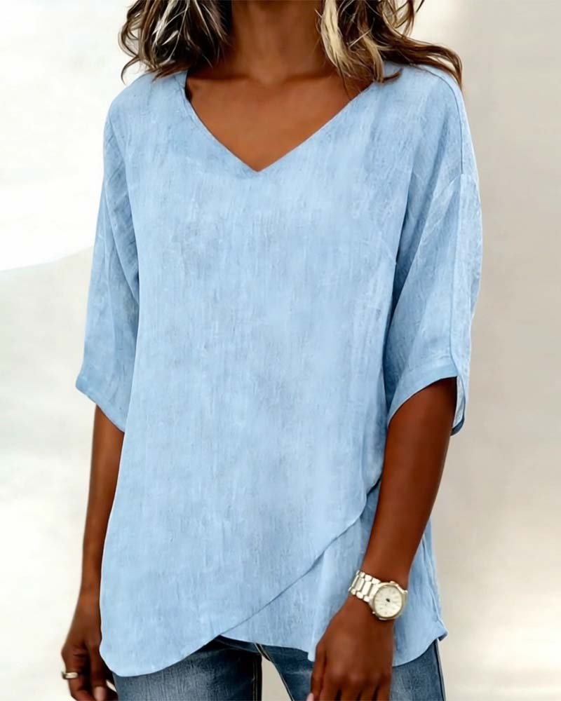 Alejandra - Blusa con bajo asimétrico y escote en V