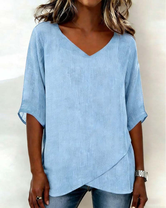 Alejandra - Blusa con bajo asimétrico y escote en V